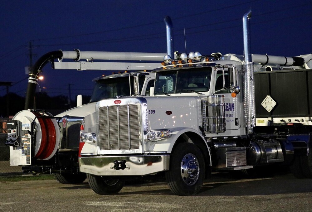 big trucks parked at night